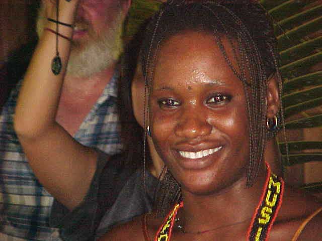 Mariam, a cousin of the Coulibalys, dances and sings